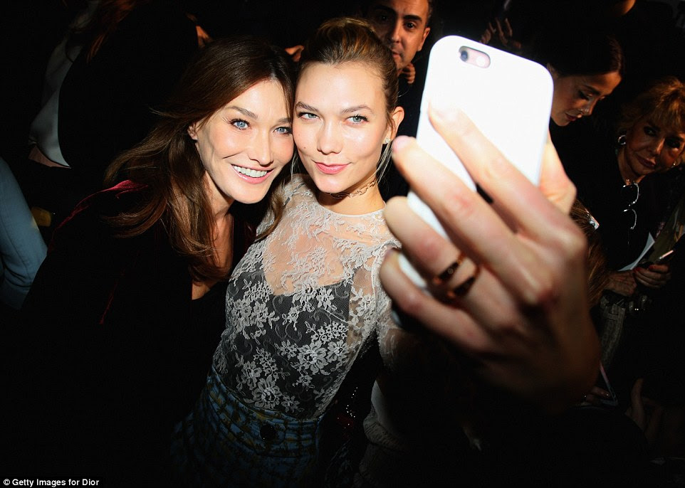 Selfie time! Karlie Kloss and Carla Bruni pose for a souvenir snap
