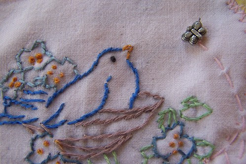 Close up of birdie embroidery