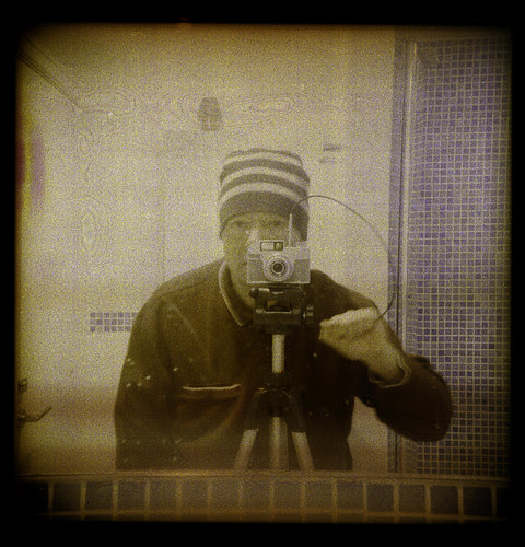 reflected self-portrait with Bencini Comet camera and striped hat by pho-Tony