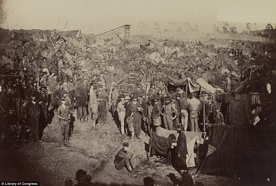 Andersonville camp, pictured in 1864, was the location of America's most notorious PoW camp during the Civil War where inmates were tortured, starved and died in their thousands