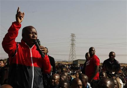 Expelled African National Congress Youth League President Julius Malema addressing the striking mineworkers at Marikana where a massacre of 34 workers took place on August 16, 2012. Malema was speaking on August 18. by Pan-African News Wire File Photos