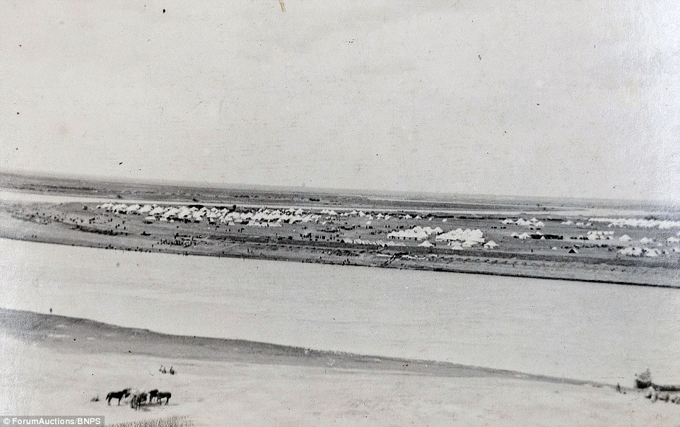 It said: 'Along the edge of the water were hundreds of tortoises and birds and wild fowl were plentiful at which the Arabs started shooting but without hitting as far as I could see.' Above shows camp along the bank of the Euphrates