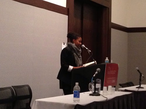 Tracy concluding the Dark Room reunion reading at AWP