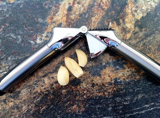 3 Garlic Cloves with Garlic Press