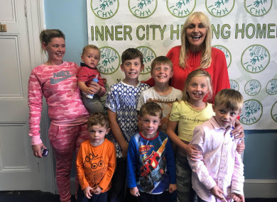 Margaret Cash and her children with RTÉ's Miriam O'Callaghan