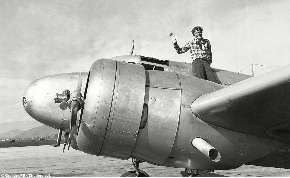Mad for plaid: Earhart was all smiles in March of 1937 (above) when she took off from Los Angeles on her planned circumnavigation of the globe