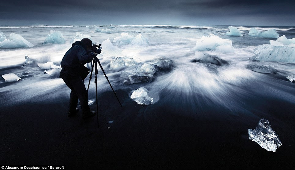 Beautiful: Adventurous photographer Alexandre Deschaumes positions his camera to create these magical pictures in Iceland at night