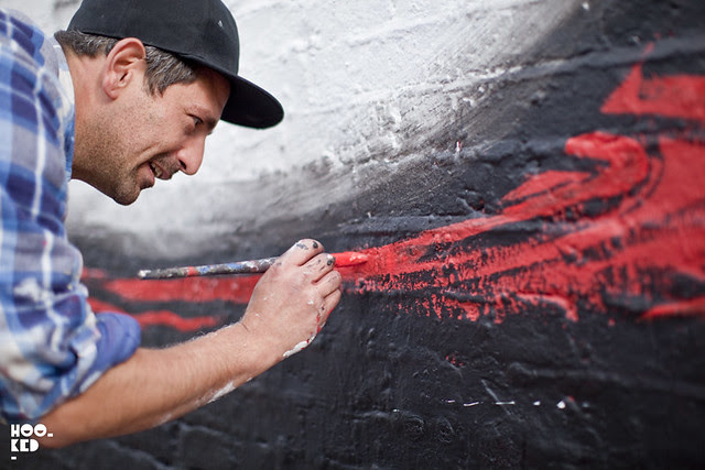 Italian street artist Run paints a new mural on East London's iconic  Village Underground Wall