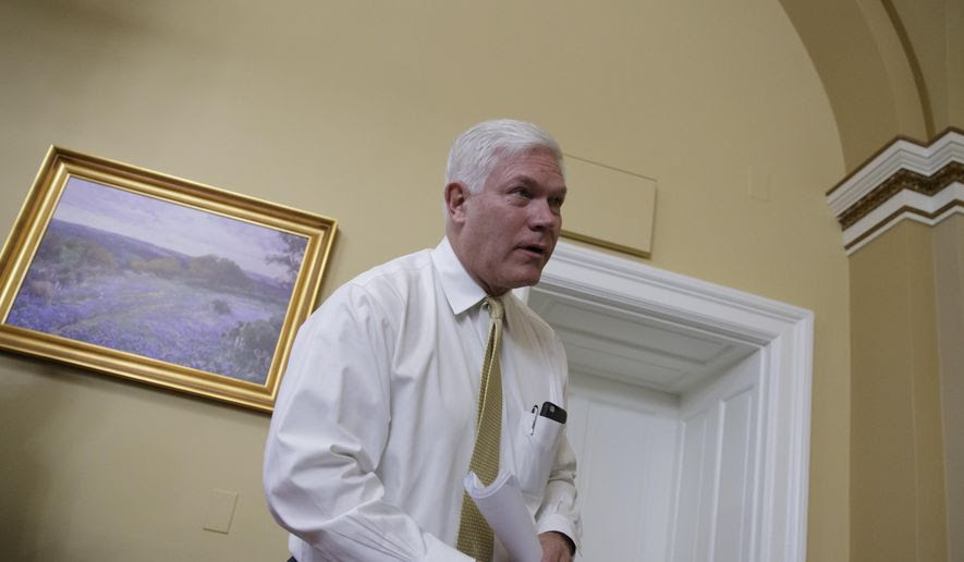 House Rules Committee Chairman Rep. Pete Sessions, R-Texas, finishes the final wording on the Republican health care bill before sending it to the floor for debate and a vote, Friday, March 24, 2017, on Capitol Hill in Washington. (AP Photo/J. Scott Applewhite) ** FILE **