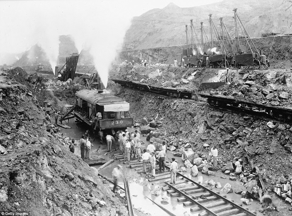 Steam shovel trains worked hard to excavate the channel of the Panama Canal - which 40,000 men were hired to help build 