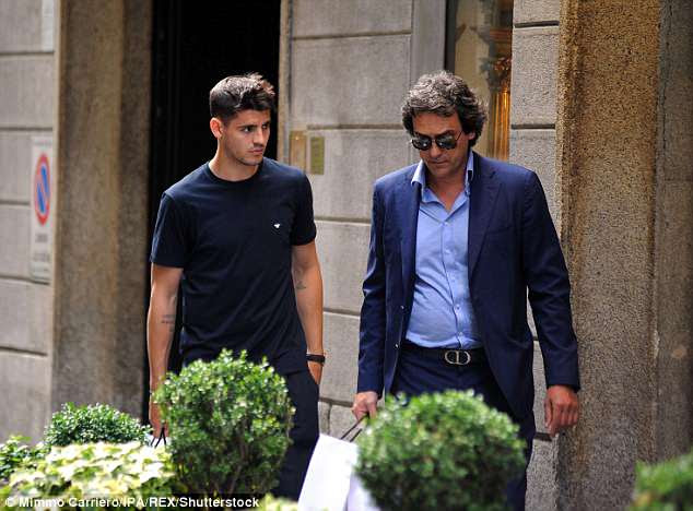Chelsea striker Alvaro Morata pictured with his agent Juanma Lopez on Wednesday