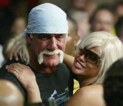 Hulk Hogan and Smith pose for photographers as they attend a boxing match Jan. 6, 2007, in Hollywood, Fla. Photo: Wilfredo Lee, Associated Press