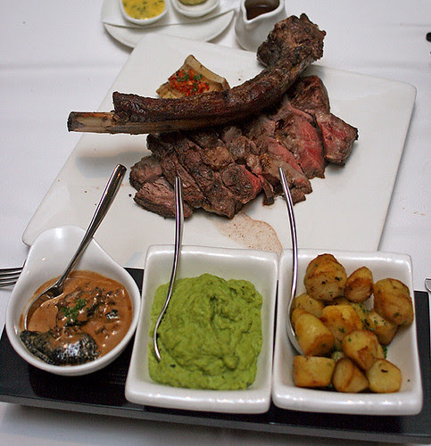 The Tomahawk steak came with portobello with morel cream, smashed peas and mint, and truffled kipfler potatoes