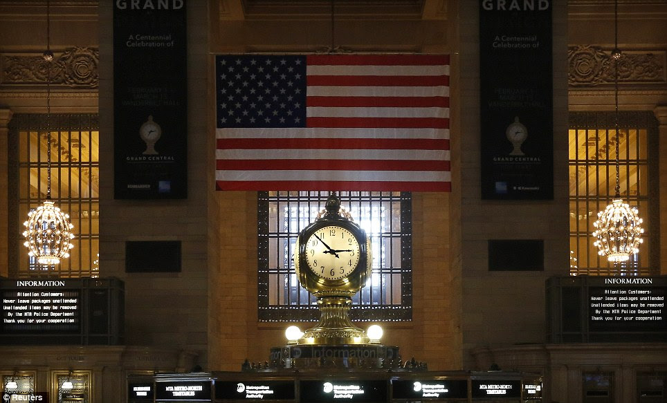 The Grand Central Terminal Clock sits above the information booth at the center of the main concourse at Grand Central Terminal in New York