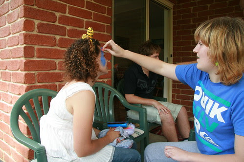 Face painting session Katie paints Bec