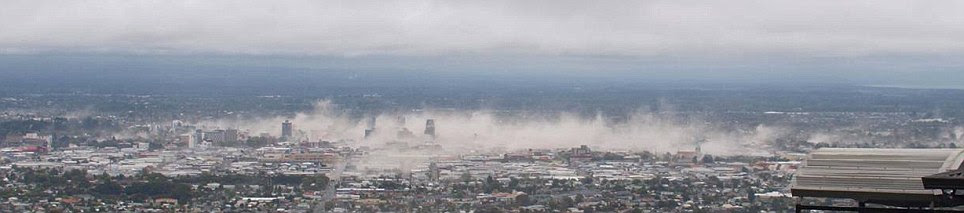 Rising dust: Seconds after the Christchurch earthquake, this picture captured the scene of widespread devastation from afarq