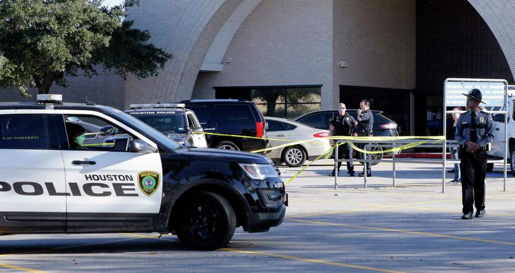 The scene of a shooting in the parking lot adjacent to the north entrance to the Sears store at the Willowbrook Mall in Houston, Nov. 24, 2017.  Photo: Michael Wyke, For The Chronicle / © 2017 Houston Chronicle