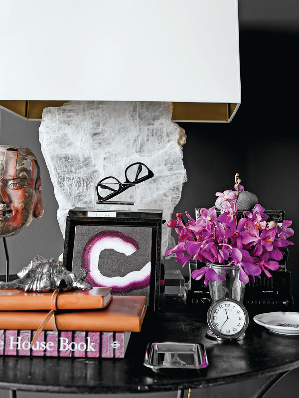 home designed by Cathy Echols, black wall, black and purple, accessories
