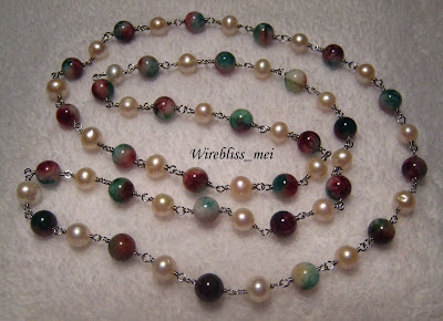 wire wrap long necklace wire wrap long necklace with pearl and a stone called "Fuk Luk Sau"