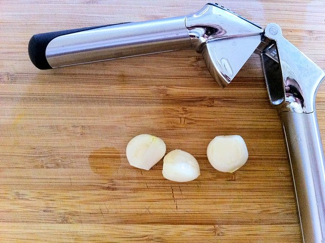 3 Garlic Cloves with Garlic Press