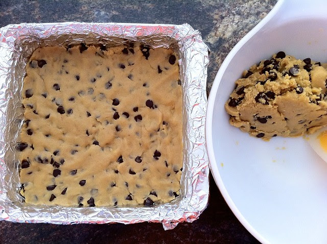 Half of Cookie Dough Pressed into Lined Pan