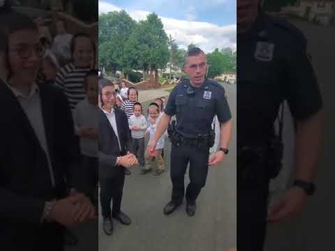 Police Officer handcuffs kid in Monroe, New York