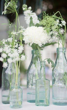 DIY Wedding Centerpiece..love the queen anne's lace. I thought a wild flower bouquet would be awesome.
