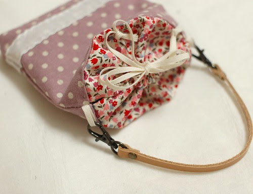 Petit pouch with leather strap