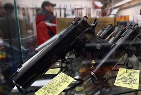 A display of 7-round .45 caliber handguns are seen at Coliseum Gun Traders Ltd. in Uniondale, New York January 16, 2013. REUTERS/Shannon Stapleton