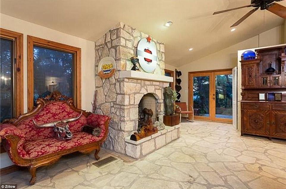 Three stone fireplaces are within the home on the sprawling ranch