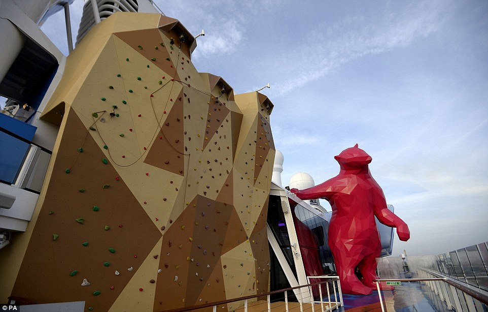 Located next to a rock-climbing wall, the jewel of the ship’s art collection is a 30-foot magenta polar bear on the exterior deck