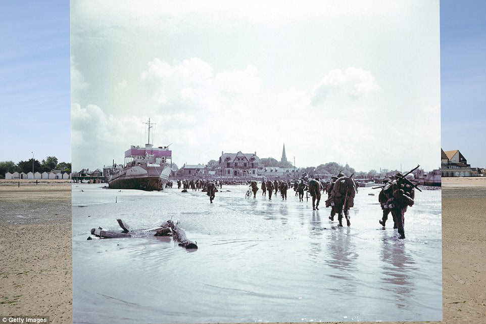 Bernieres-sur-Mere, France: Troops of the 3rd Canadian Infantry Division, carrying masses of equipment, land at Juno Beach on D-Day. 2014: The beach huts that line the sand show the area in peace time