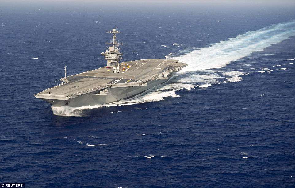 The Navy said the USS Harry S. Truman aircraft carrier (file picture) and its strike group will depart Norfolk, Virginia, on Wednesday for a regularly scheduled deployment to Europe