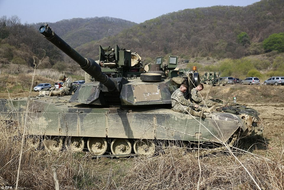 US soldiers prepare for a military exercise near the border between South and North Korea on April 15 in Paju, South Korea