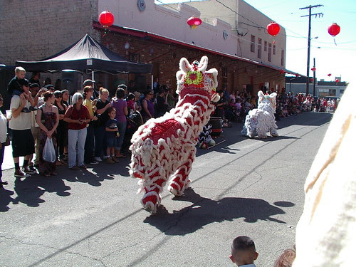 red and whie lion dancers