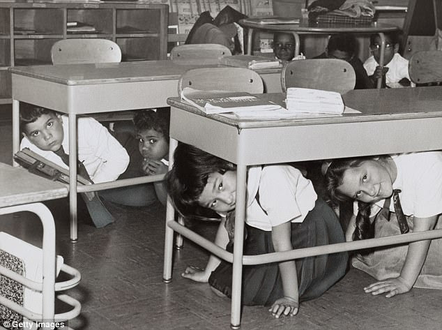 Just like the the Cold War in the 1940s and 1950s, each side has reason to fear its opponent gaining a technological upper hand, the expert says. Students practice a duck and cover drill at a Brooklyn middle school, 1962