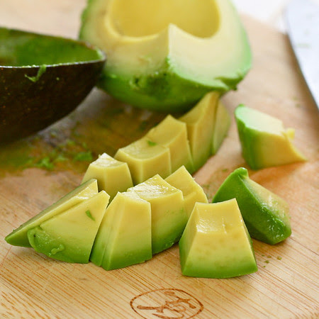 Chopped avocado on a cutting board