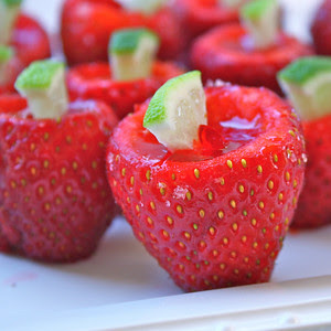 Strawberry Margarita Jell-O Shots Strawberry Jell-O Shots filled with tequila and decorate with lime wedges
