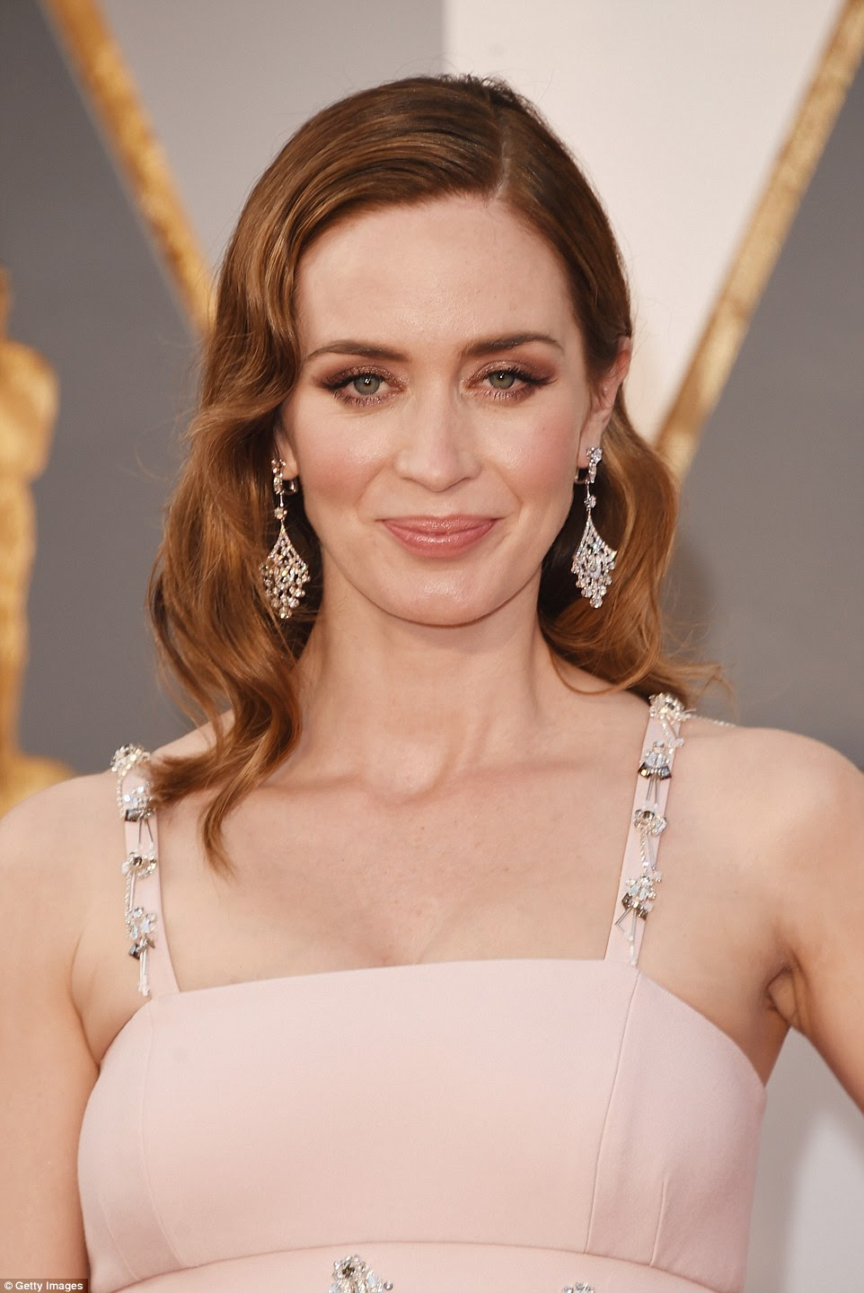 Drop dead gorgeous: The beauty showed off some seriously expensive dangly diamond earrings on the red carpet