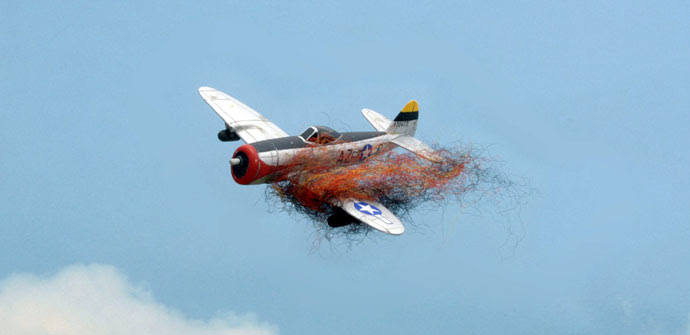 A P-47 goes down in flames. A P-47 goes down in flames.