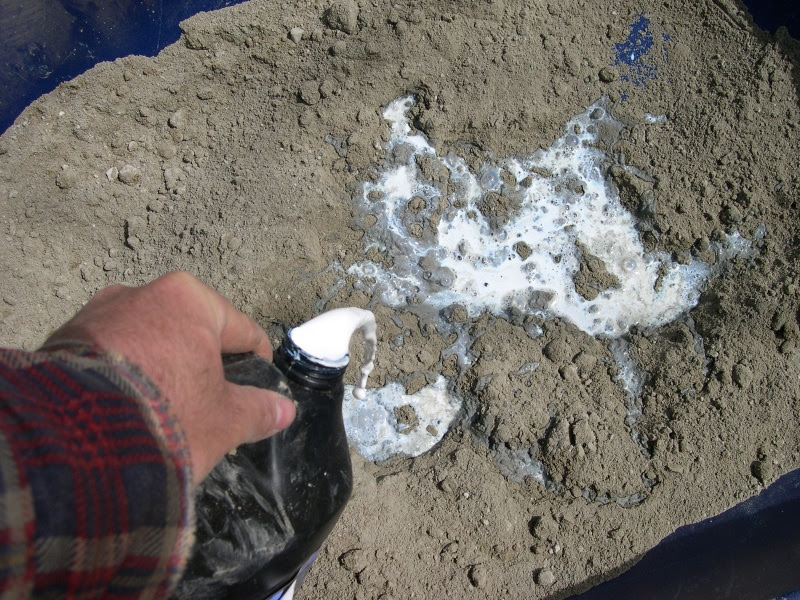 Garage door opener chain adjustment: Waterproof cement mix