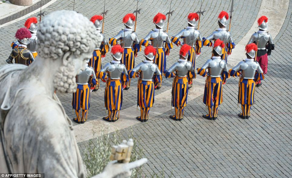 Standing to attention: Swiss guards at St Peter's Square before the Easter celebrations 