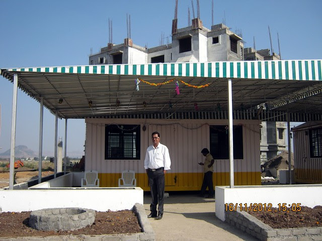 Mr. Saif B. Shaikh Manager Sales & Marketing at the Site Office of Elite Green Acres at Kanhe