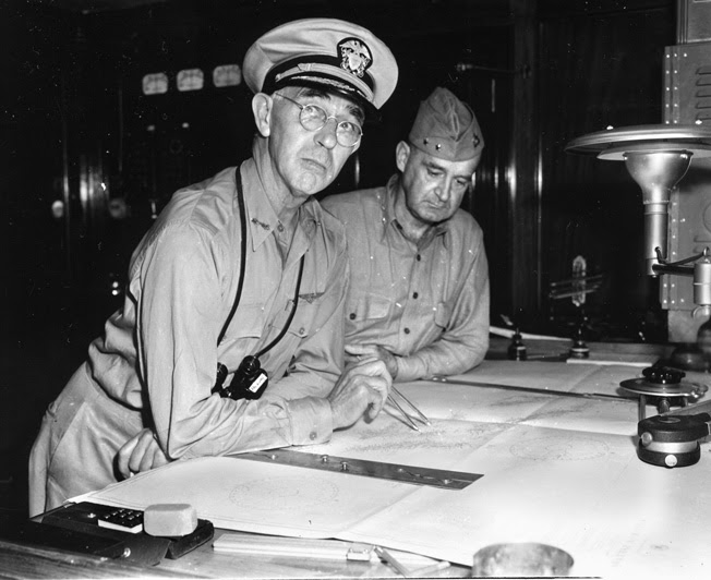 Surprised brass: Admiral Richmond Kelly Turner (left) and USMC Major General Alexander Vandegrift confer aboard the USS McCawley shortly before the Japanese attack.