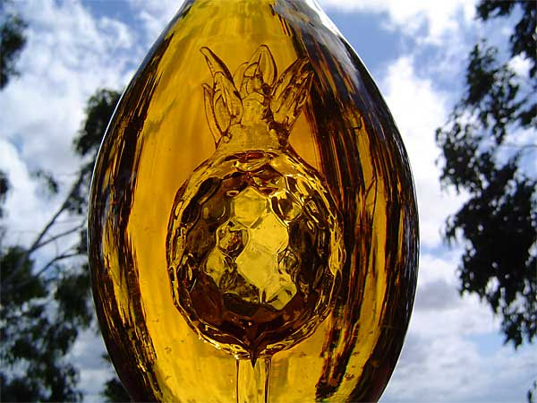 photo of an ornate pineapple liqueur bottle