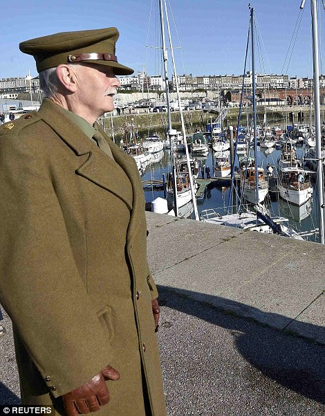 Taking part: A re-enactor in period costume looks out over Ramsgate harbour