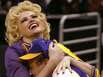 Smith, left, and Danny DeVito clown around during a Los Angeles Lakers' game in 2004.
