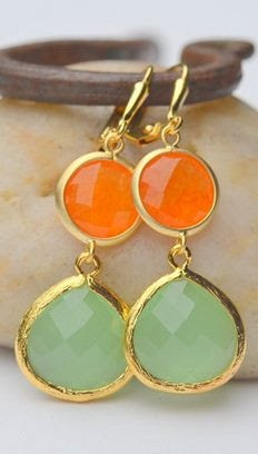 http://www.pinterest.com/pin/91620173641637355/ orange, gold and mint! really loving these colors together!
