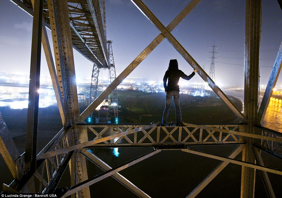 Exploring every corner of the globe: Ms Grange stood on the Transporter Bridge in Newport, Wales
