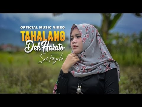 Lirik Lagu ' Tahalang Dek Harato ' SRI FAYOLA - Toba Lirik